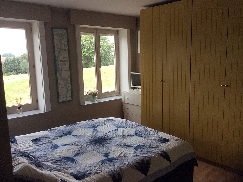 Master bedroom with front view of windmill.