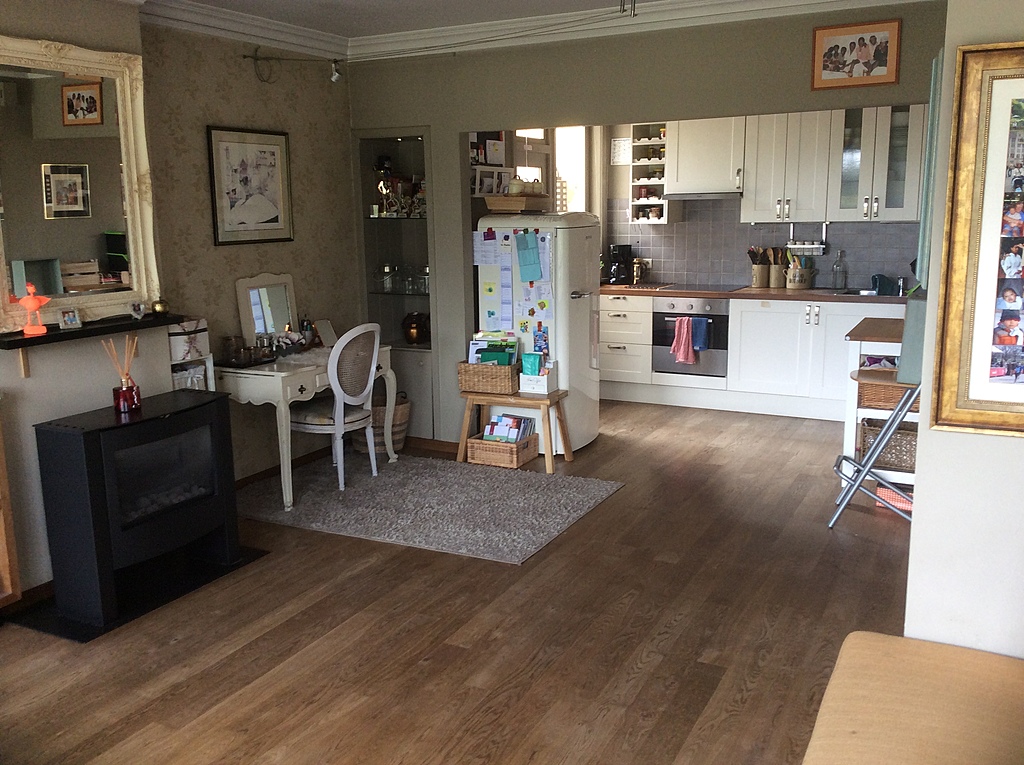 Living room, view towards the kitchen