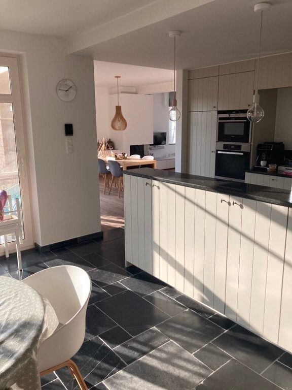 Keuken: foto 4 met zicht op de eet- en zitkamer