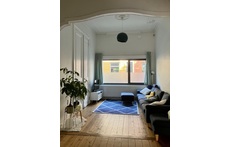 Cozy living room with authentic elements consisting of two parts.
