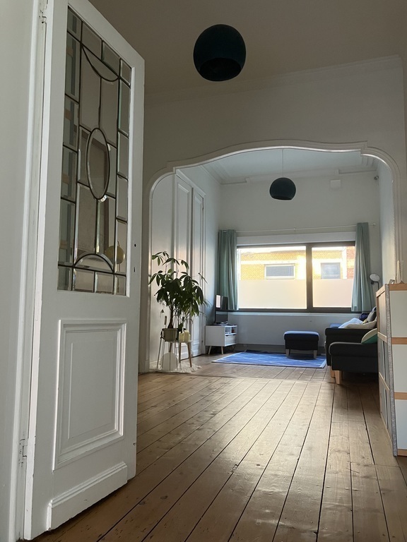 Cozy living room with authentic elements consisting of two parts.