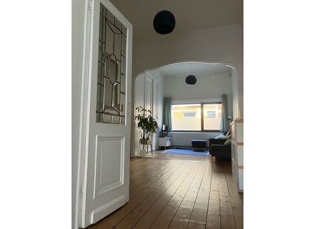 Cozy living room with authentic elements consisting of two parts.