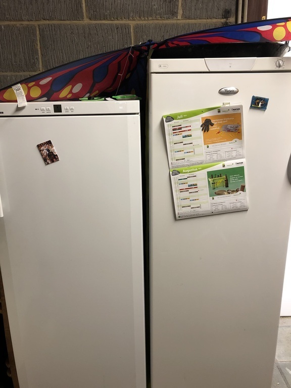 Garage with extra fridge and freezer