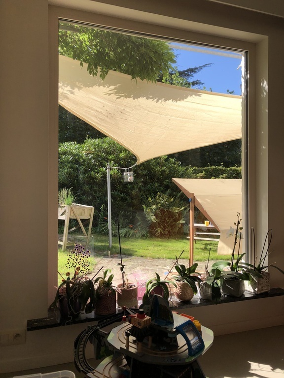 Dining room with a view of the garden and sandpit