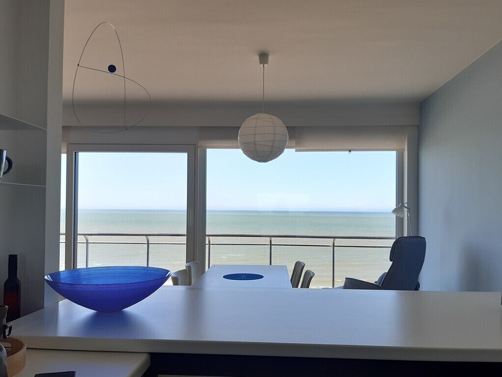 View from kitchen to dining area and the sea