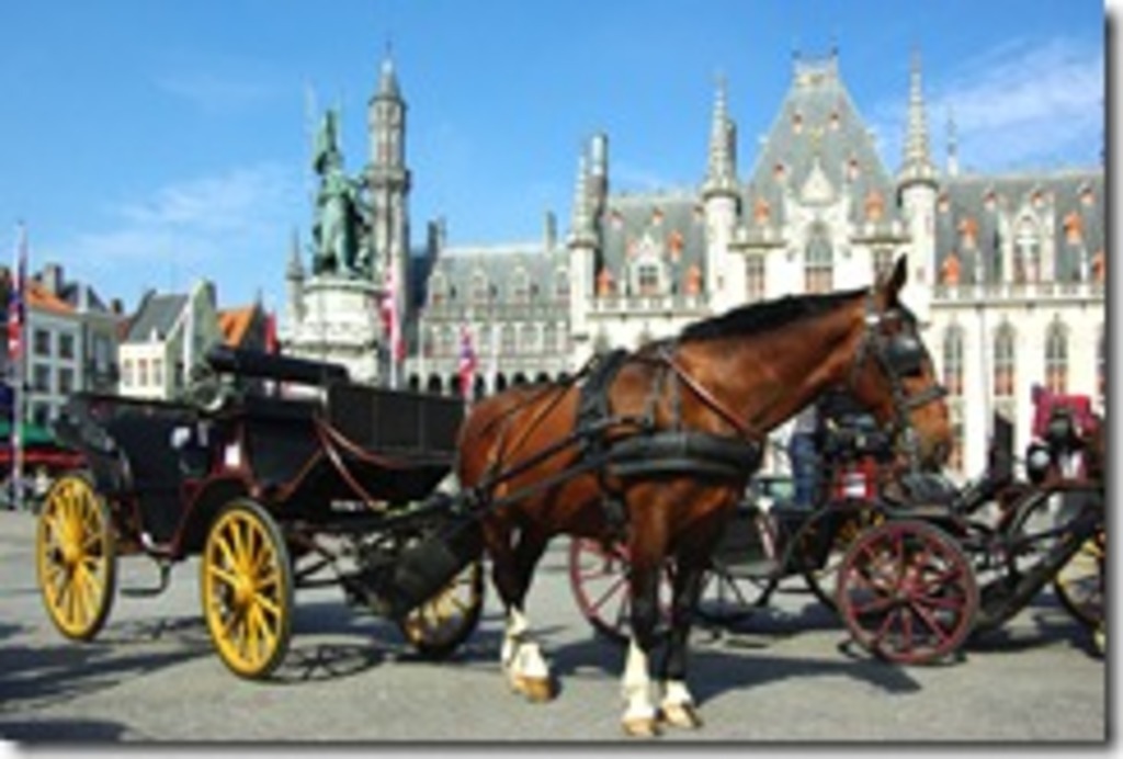 explore Bruges by horse and carriage as in the Middle Ages