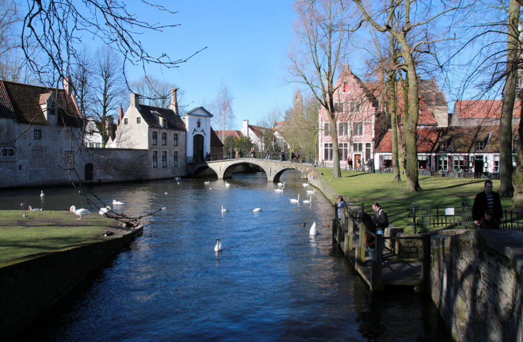 Minnewaterpark in the centre of Bruges with its famous white swans