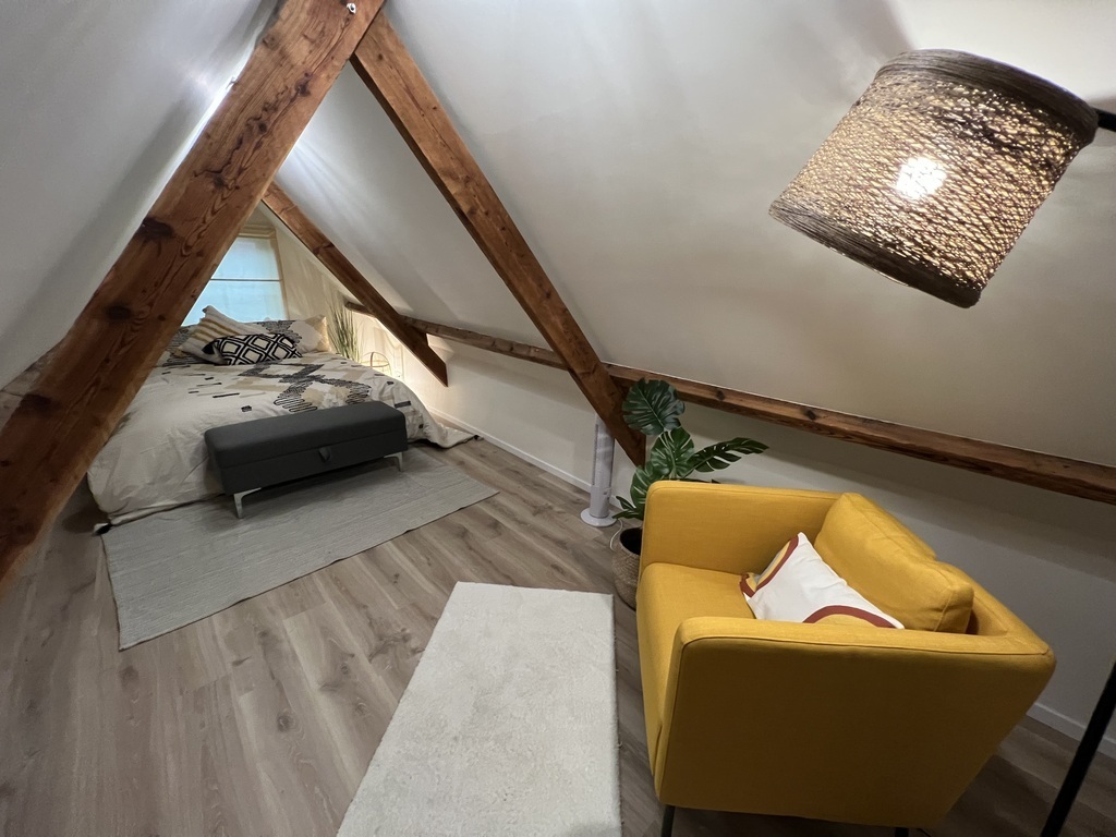 loft bedroom with queen bed