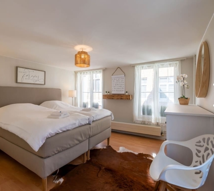 master bedroom with king bed on 1st floor