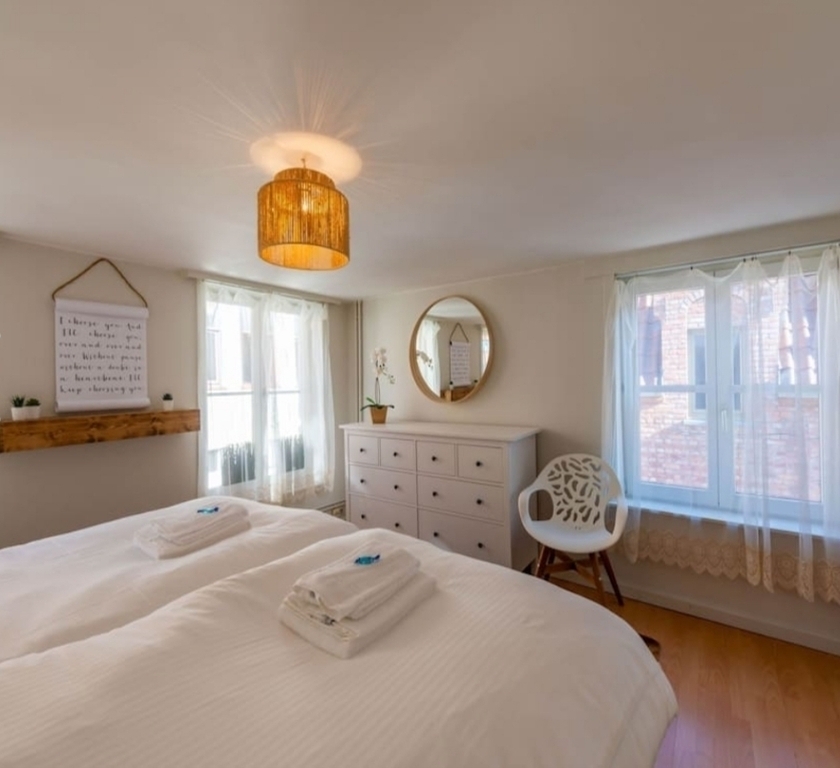 master bedroom with king bed on 1st floor