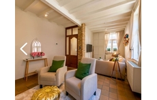 living room with fireplace and tv