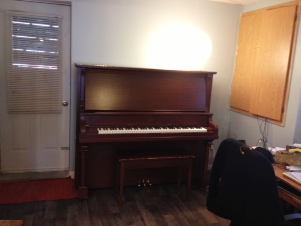 Basement / family room: piano