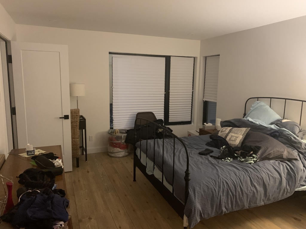 Master bedroom with adjacent bathroom 