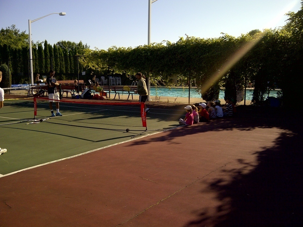 Neighbourhood pool and tennis courts