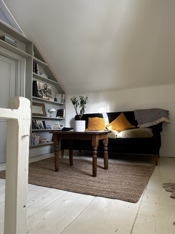 Sitting room on second floor where the principal bedroom and sewing room/bedroom are