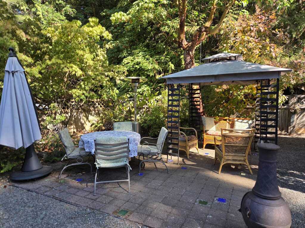 Brick patio with various seating options.