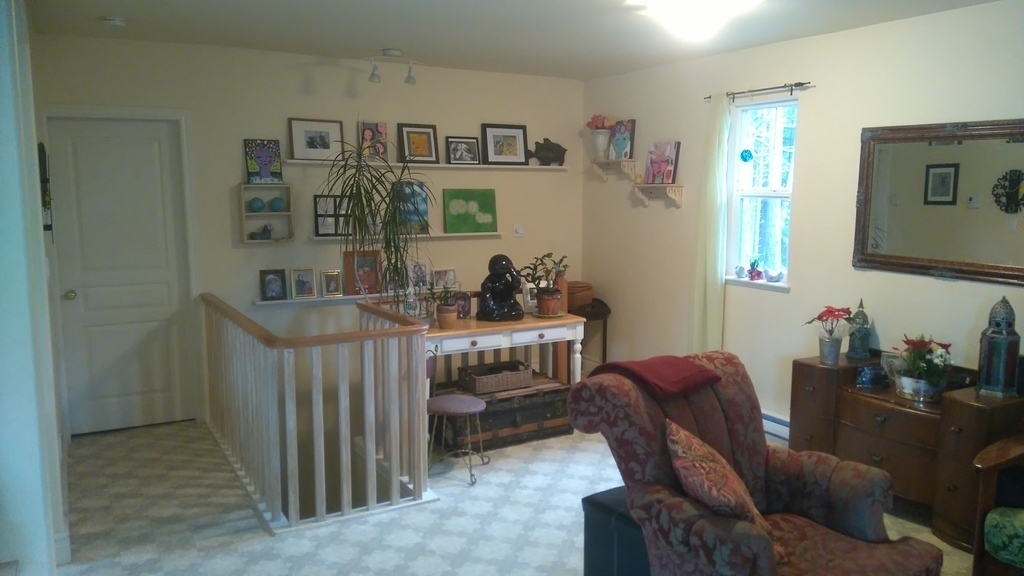 Stairway leads to two bedrooms, and laundry room, all are at ground floor.