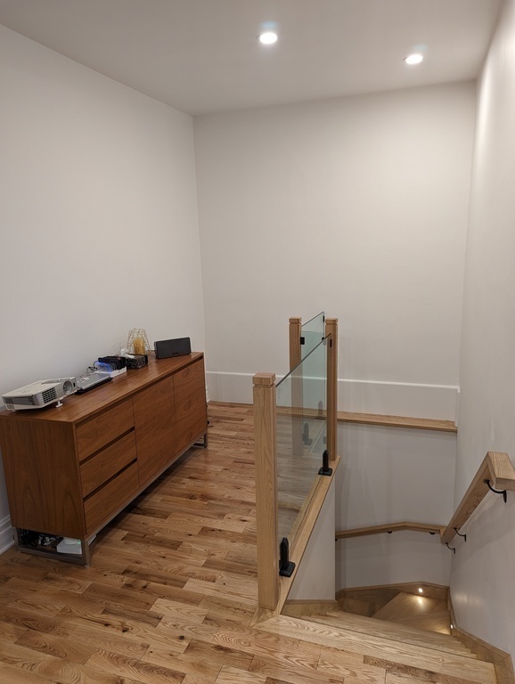 New stair to the family room, also our home cinema space for movies with a projector (and Fire TV)