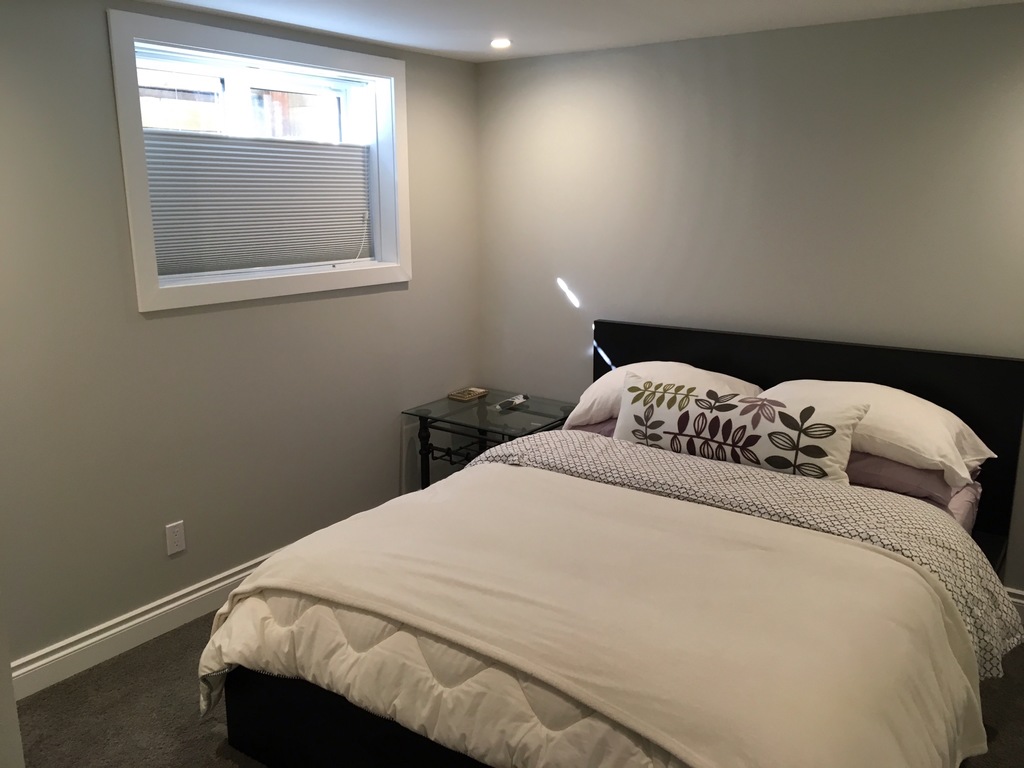 Bedroom #4 in lower level, 15 sq meters, queen bed is 153cm X 203cm.