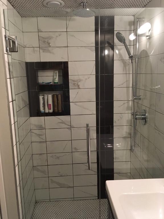 Bathroom in lower level.  Brand new in 2017.  In floor heat, rain head shower.