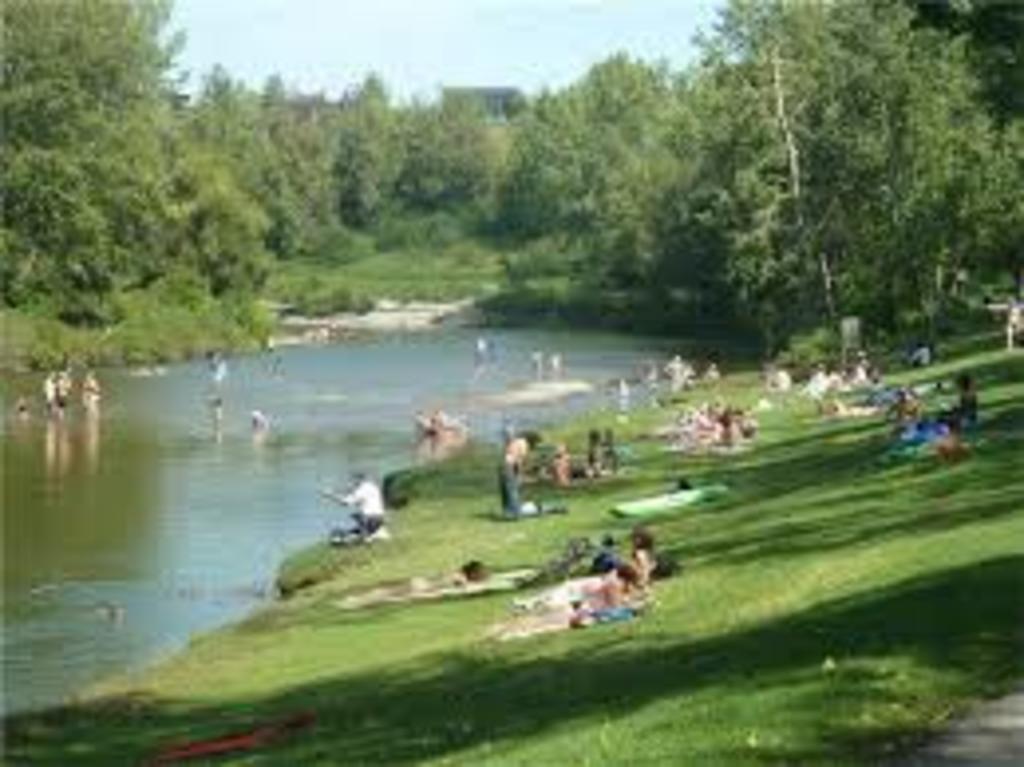 Stanley park.  There is a summer seasonal pool, but some prefer the river when it's hot in the summer.