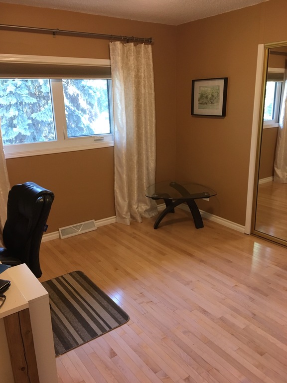 Bedroom #3.  11 sq meters. Used as office.  We add a crib to this room occasionally.