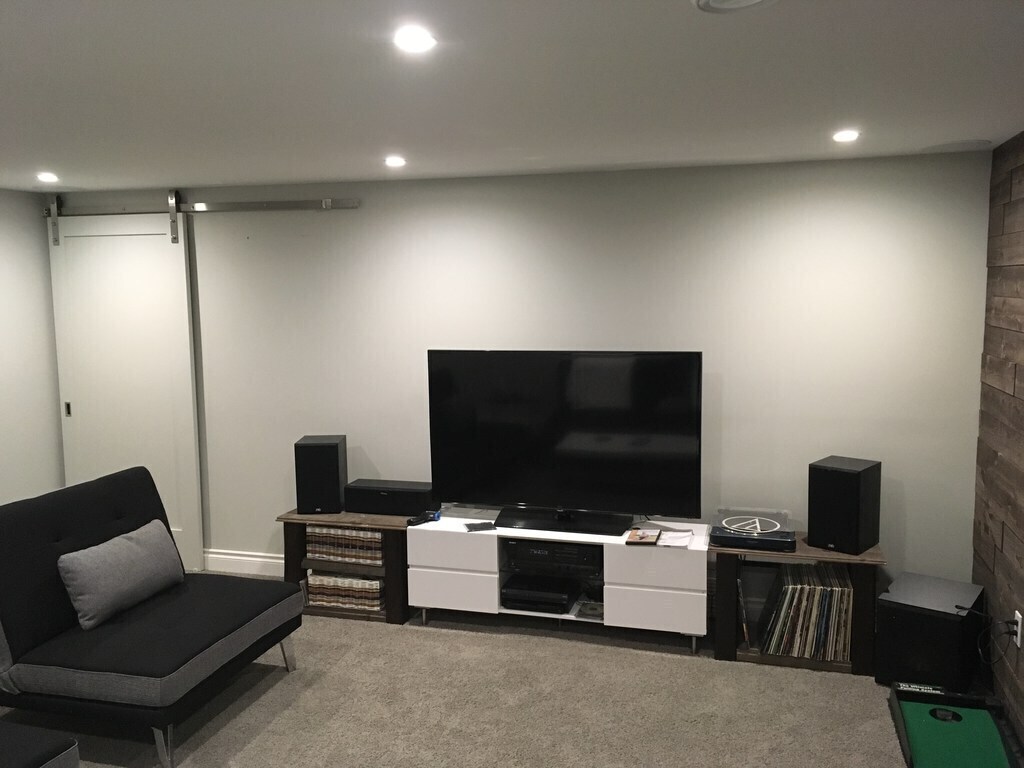 Lower living area big screen TV, stereo, and in ceiling speakers. Walls and ceilings have acoustical insulation.