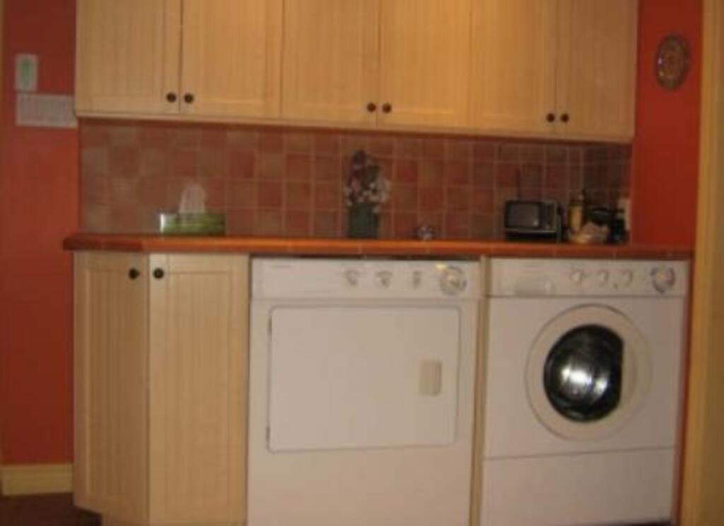 Salle de lavage au sous-sol