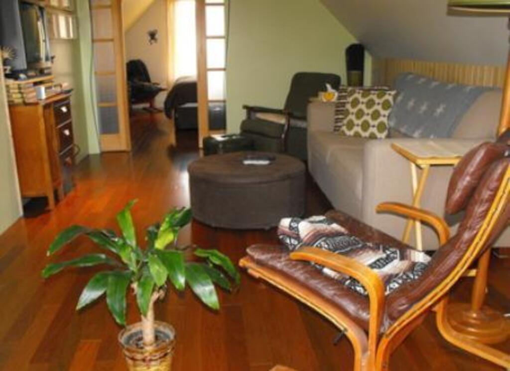 Salon à l'étage avec divan-lit