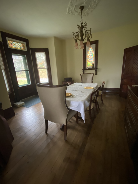 Dining room table seats 8 comfortably 