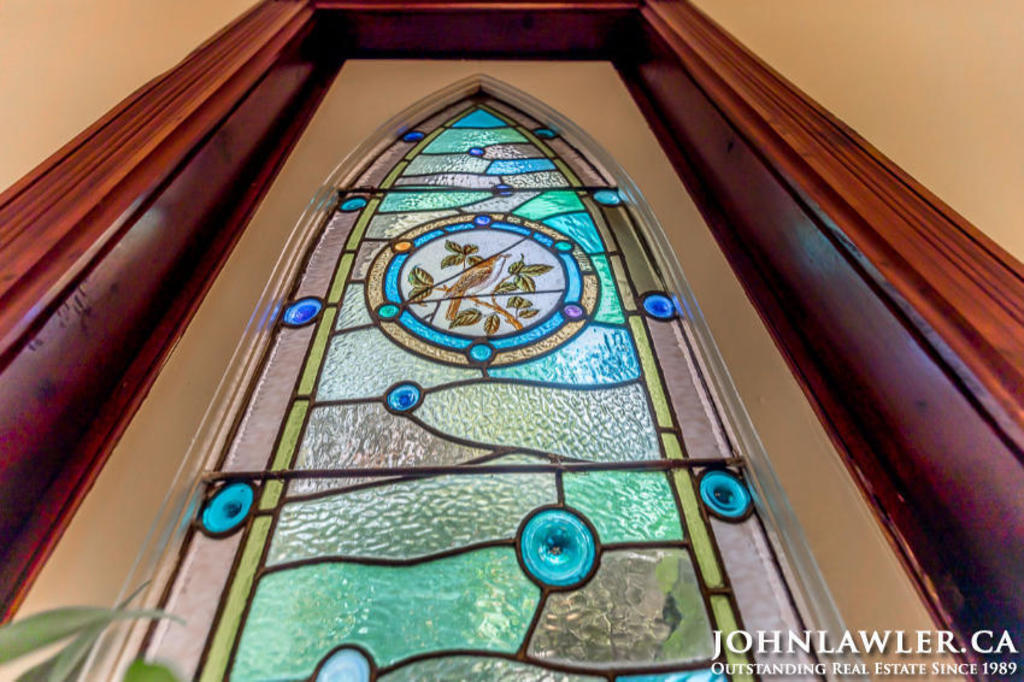 The house has several original stained glass windows