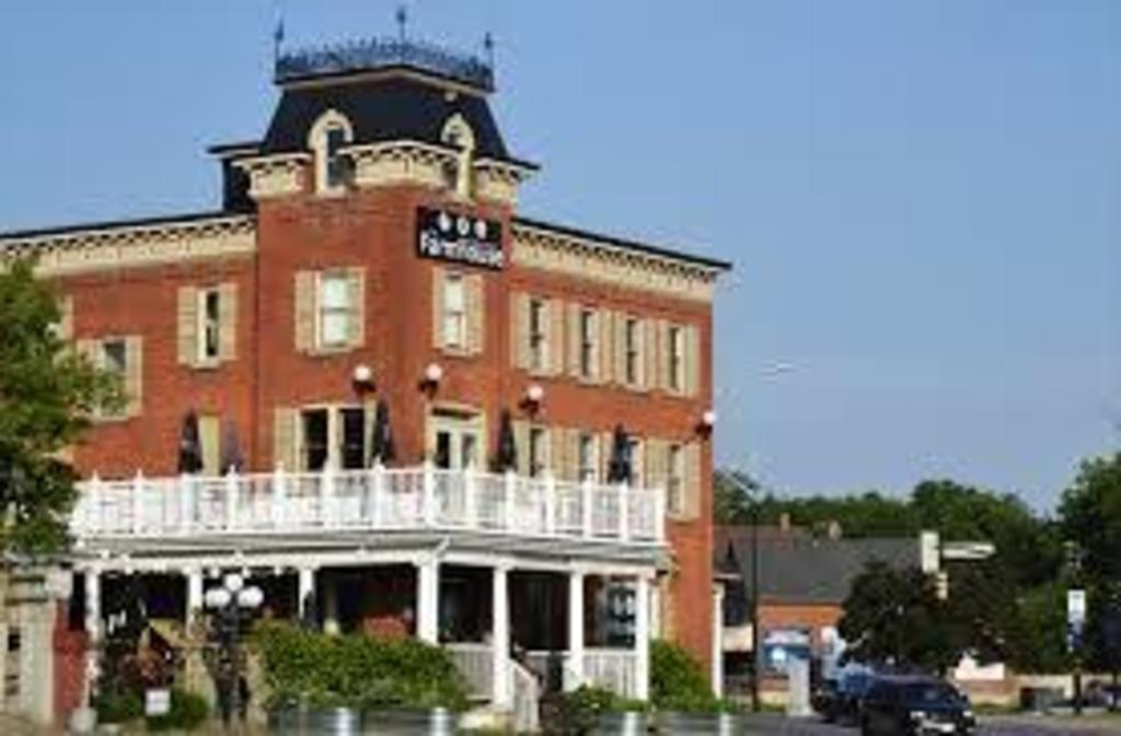 Farm House Restaurant, just a short walk from our home, with a terrace and balcony overlooking the lake.