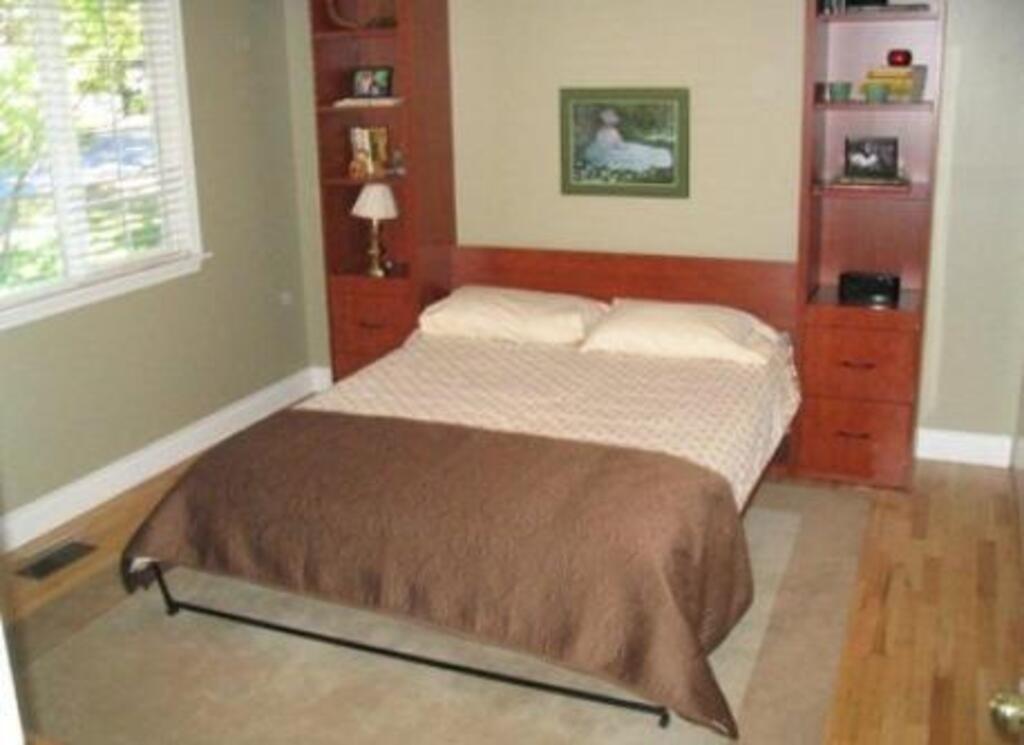 guest bedroom with murphy bed that flips up/down