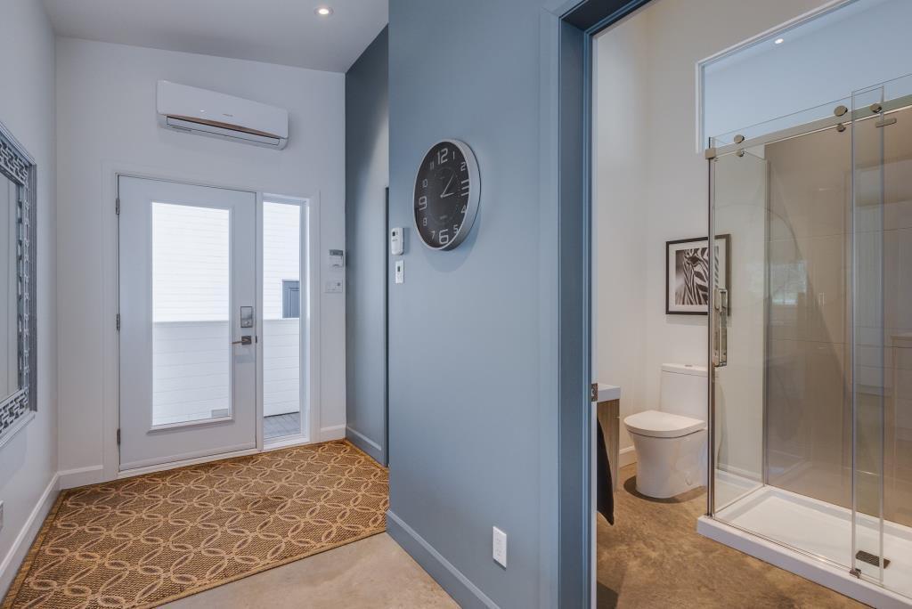 Front entrance with view to upper full bathroom