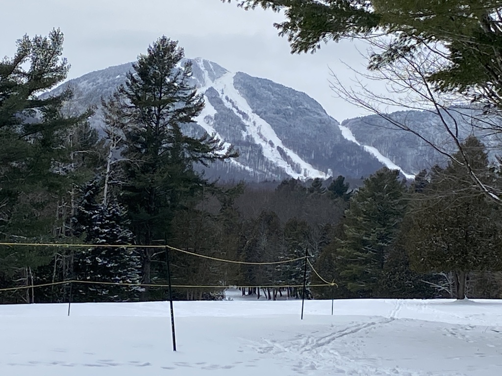 Snowshoeing on the golf course - view of Mont-Orford ski runs