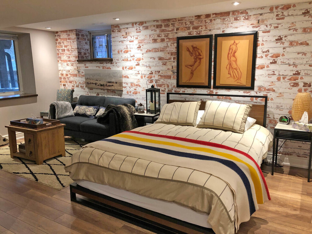 Basement guest suite queen size bed