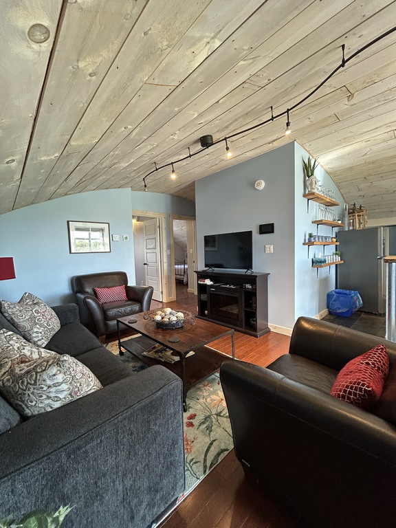 Rounded pine ceilings create a peaceful retreat.