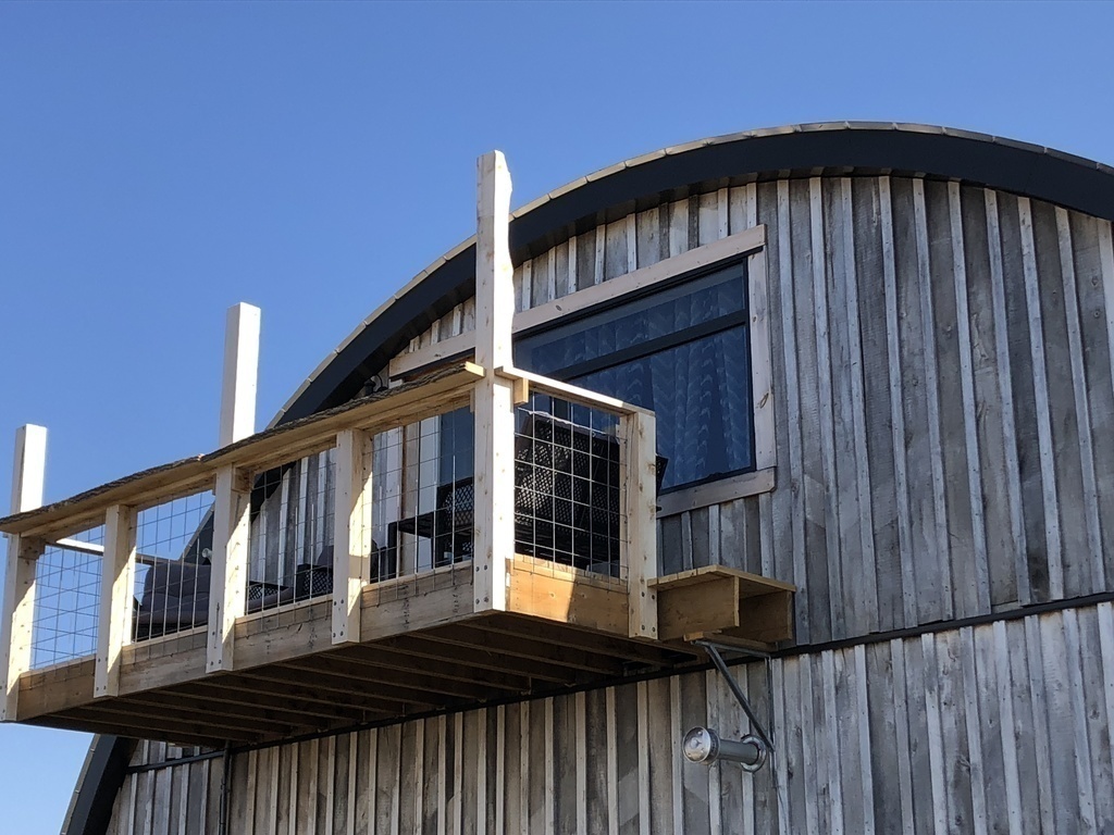 Furnished balcony with added shade during Summer months