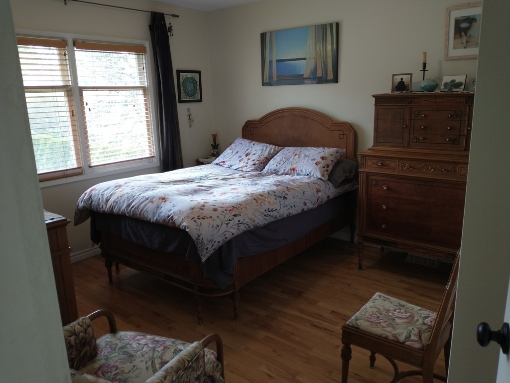 Upstairs main bedroom with double bed.