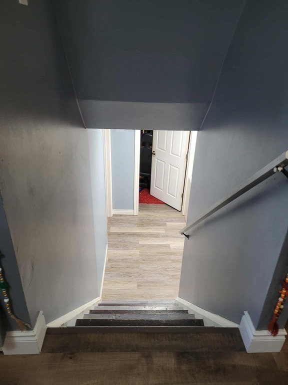 Stairs to 2 lower levels