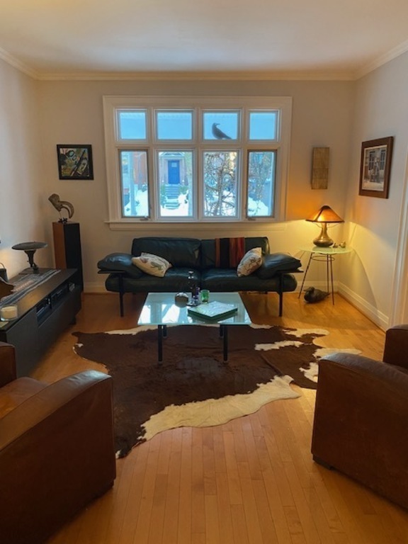 Comfortable living room with stereo equipment, tons of cds and blue tooth speaker system for listening to music. Where we enj...