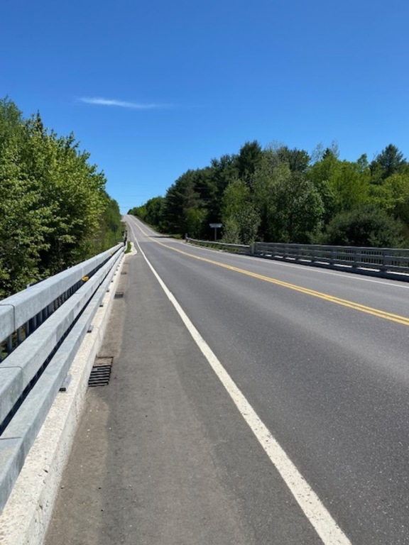 Highway leading to cottage lane.  Ontario is known for its beautiful big skies! 