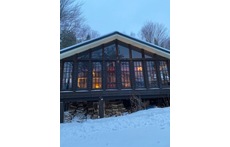 3 season front porch. French doors come out for an open feel.  
