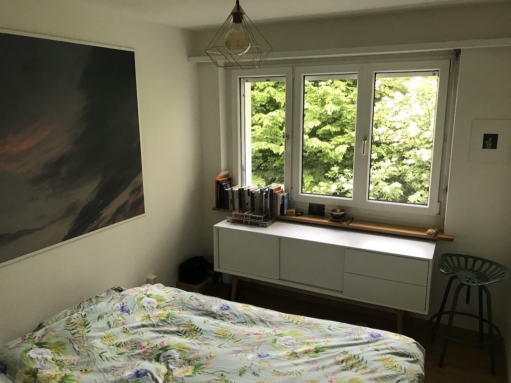 masters bedroom with contemporary art photograpy