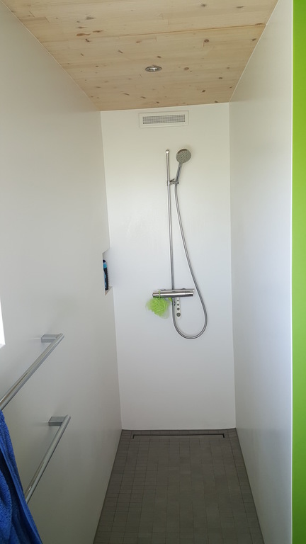 Master bathroom with toilet, shower and bathtub