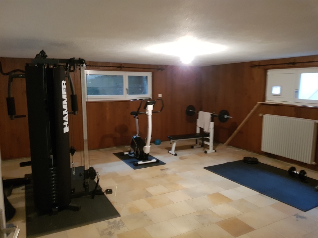 fitness room with TV
