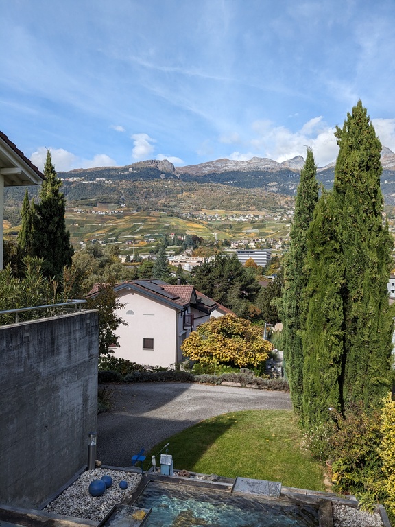 View to Crans-Montana from house with fountain