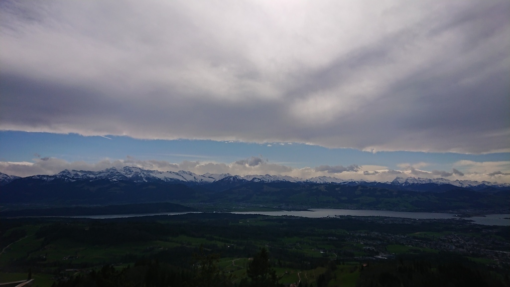 View from "Bachtel"-viewing-platform over the Lake of Zurich to the Alps