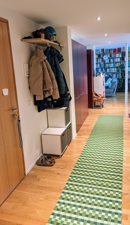 Flat entrance with view towards the living and dining room