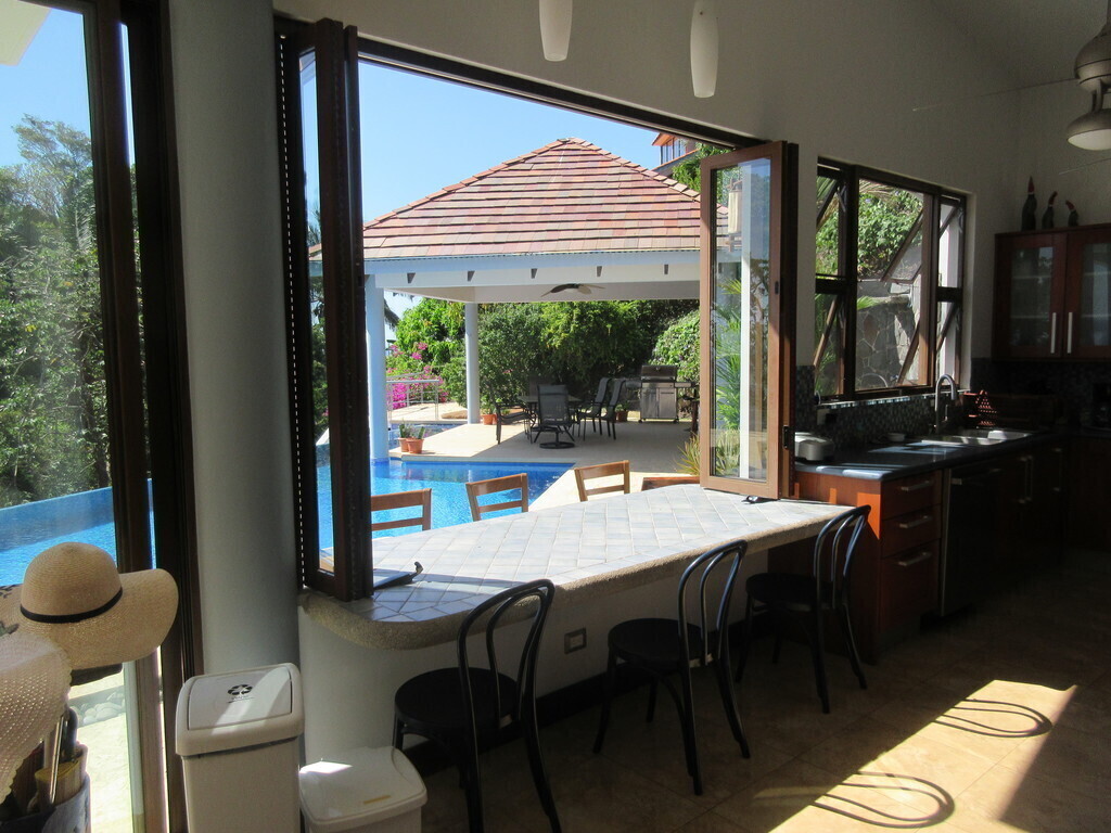 Kitchen table at pool side 
